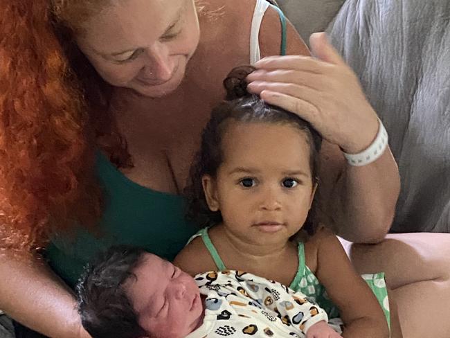 Mum rescued in flood waters welcomes baby boy