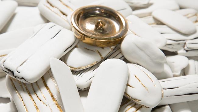 Midden (all that glitters), detail, by Honor Freeman. Slip cast porcelain, gold lustre, gold leaf. Courtesy the artist and Sabbia Gallery, Sydney. Picture: Craig Arnold.