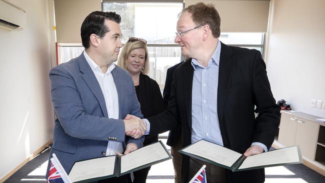 Federal Housing Minister Michael Sukkar, left, and Tasmanian Housing Minister Roger Jaensch after signing the Tasmanian housing debt agreement. Picture: CHRIS KIDD