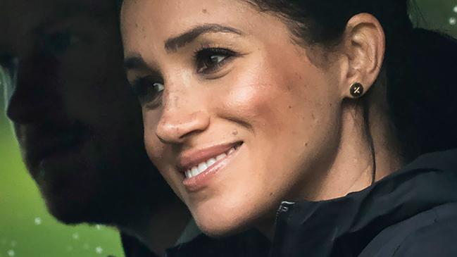 (FILES) In this file photo taken on October 30, 2018 Britain's Prince Harry and his wife Meghan, Duchess of Sussex arrive for the unveiling of a plaque dedicating 20 hectares of native bush to the Queen's Commonwealth Canopy project at The North Shore Riding Club in Auckland on October 30, 2018. - Britain's Prince Harry and wife Meghan Markle are expecting their second child, their spokesman told British media on February 14, 2021. (Photo by STR / POOL / AFP)