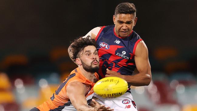 Demon Neville Jetta and Giant Zac Williams lock horns. Picture: Michael Klein