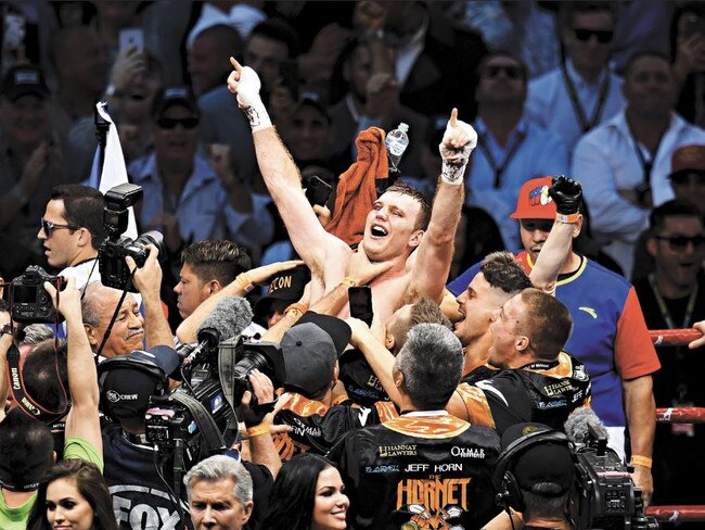 Horn celebrates his victory over Pacquiao at Suncorp Stadium. Picture: Peter Wallis