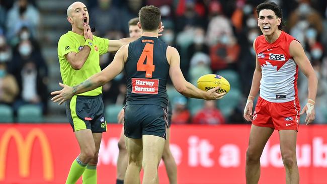 Umpires will be tough on players who try to waste time this season. Picture: Steve Bell/AFL Photos/via Getty Images