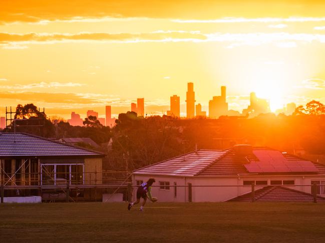 Stock image, Solar panels, sunset, new build, suburbia, building, afternoon kid playing. Picture: Jason Edwards