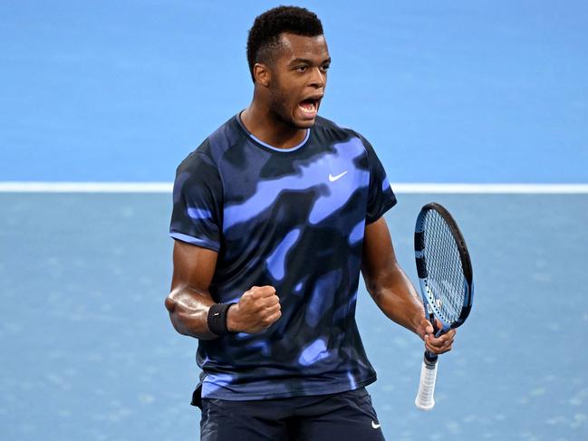 Giovanni Mpetshi Perricard of France reacts after a point during his men's singles match against Frances Tiafoe of the US at the Brisbane International tennis tournament in Brisbane on January 2, 2025. (Photo by William WEST / AFP) / --IMAGE RESTRICTED TO EDITORIAL USE - STRICTLY NO COMMERCIAL USE--