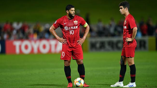 Shanghai SIPG FC players Hulk, left, and Oscar during their AFC Champions League match against Sydney FC. Picture: AFP