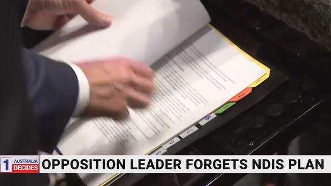 Labor leader Anthony Albanese flicks through a folder during yesterday’s press conference. Picture: Sky News