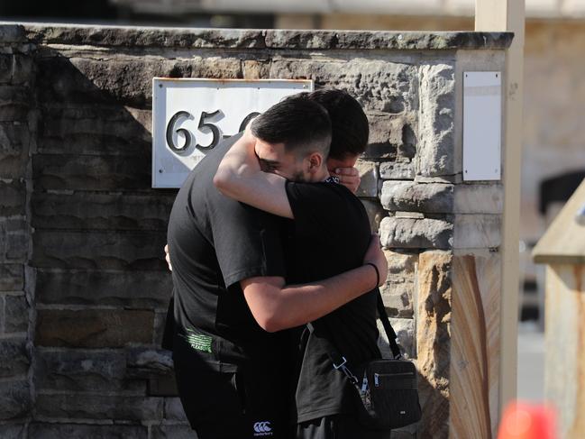 Mourners outside the funeral.