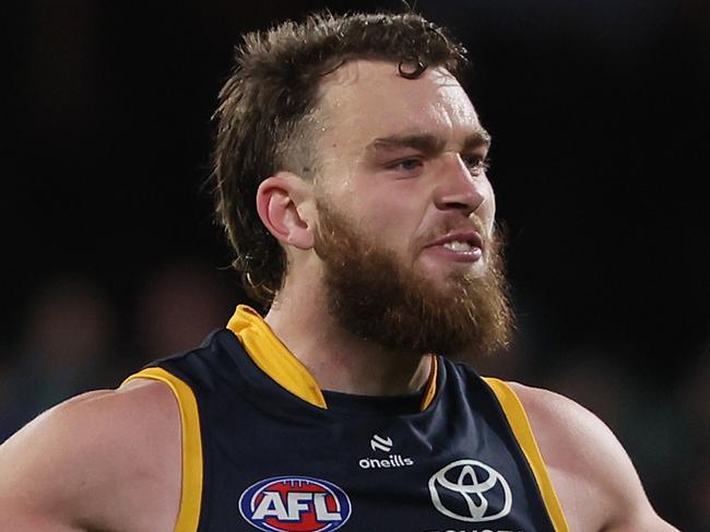 ADELAIDE, AUSTRALIA - AUG 17: Riley Thilthorpe of the Crows celebrates a goal during the 2024 AFL Round 23 match between the port Adelaide Power and the Adelaide Crows at Adelaide Oval on August 17, 2024 in Adelaide, Australia. (Photo by James Elsby/AFL Photos via Getty Images)