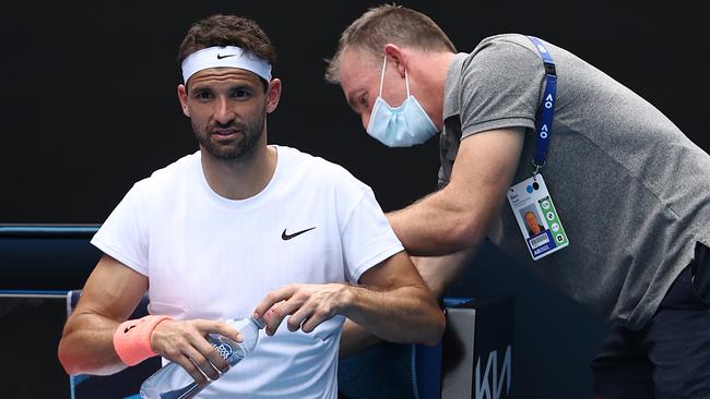 Grigor Dimitrov struggled with a back injury during his quarterfinal clash with Aslan Kartsev. Picture: Getty Images