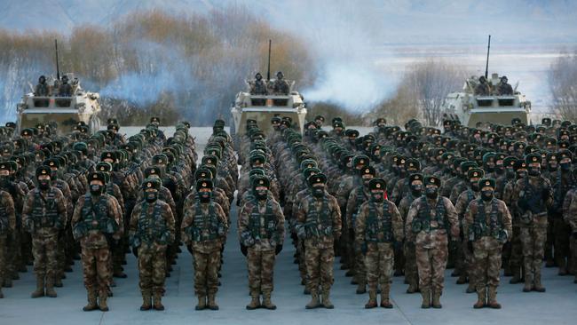 Chinese People's Liberation Army train at Pamir Mountains in Kashgar, in northwestern China's Xinjiang region, last month. Picture: AFP