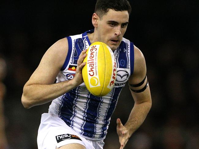 Paul Ahern of the Kangaroos runs forward during the Round 17 AFL match between the Essendon Bombers and the North Melbourne Kangaroos at Marvel Stadium in Melbourne, Saturday, July 13, 2019.  (AAP Image/Hamish Blair) NO ARCHIVING, EDITORIAL USE ONLY