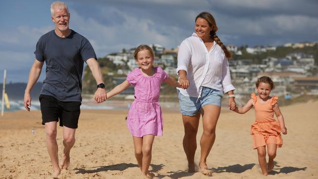 Former NRL player Scott Dureau with his wife Libby and daughters Imogen, 7, and Everly, 4. Picture: David Swift