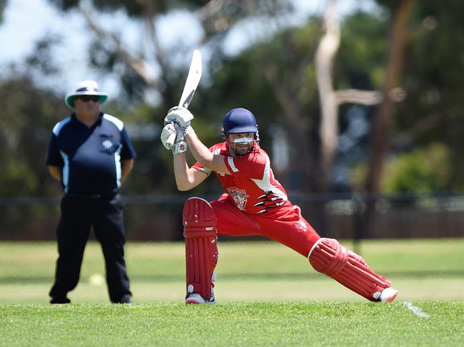 Devon Meadows batsman Lucas Carroll square drives.