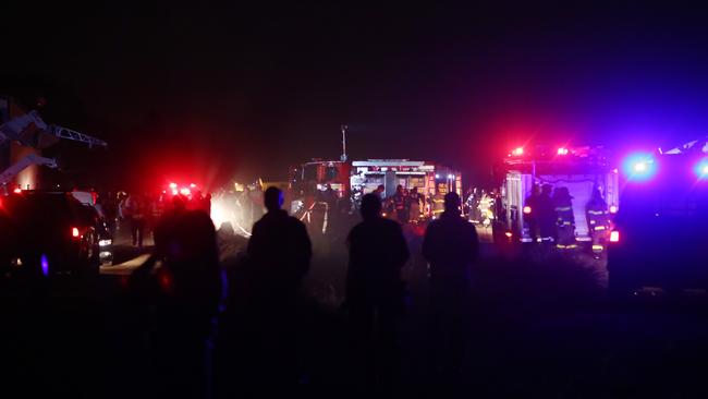 South African paramedics and emergency services gather at the scene of a plane crash at Wonderboom. Picture: AFP