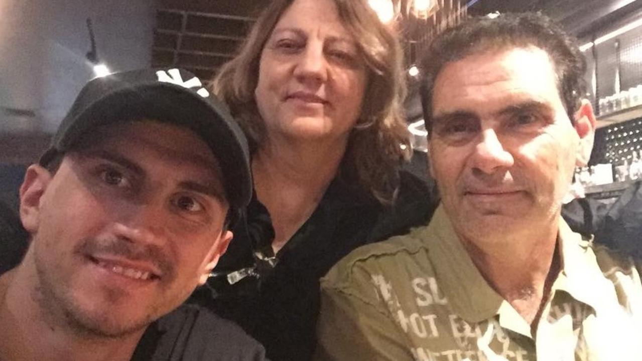 Chris Puglia with his parents, Loris and Frank.