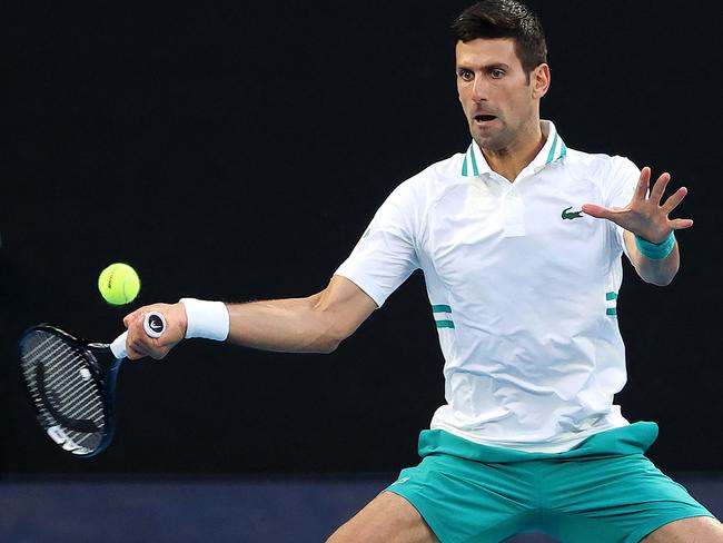 Novak Djokovic in action. He’s still trying to deal with complications as he seeks to play in this year’s Australian Open. Picture: AFP