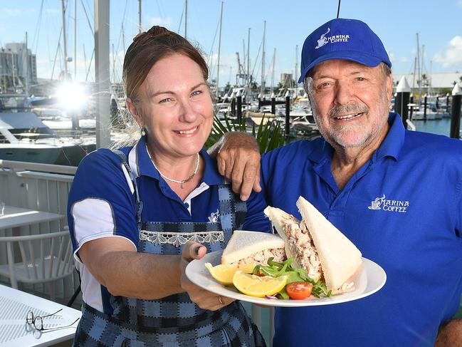 Marina Coffee manager Brydy Stanfield and owner Ron Barker with the cafÅ½ specialty, The Crab Sandwich. Picture: Shae Beplate.