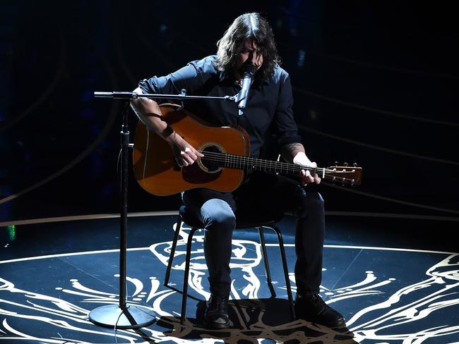 Dave Grohl performs during the memorial reel.