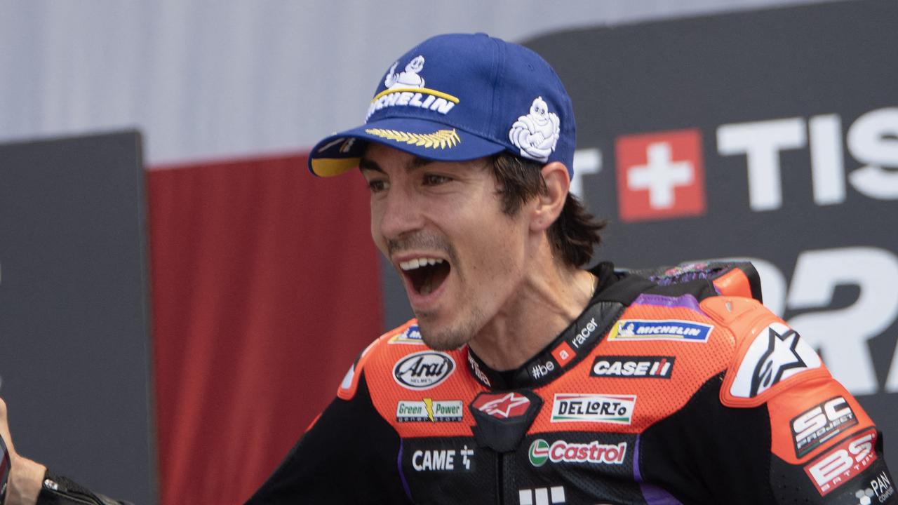 Maverick Vinales of Spain and Aprilia Racing celebrates the victory on the podium.