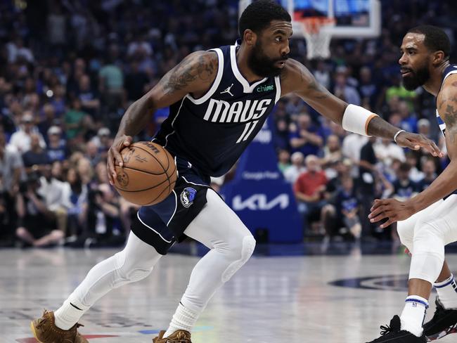 Kyrie Irving drives to the basket for the Dallas Mavericks. Picture: Matthew Stockman/Getty Images.