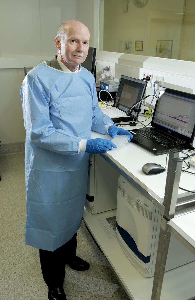 Professor Graeme Nimmo in the laboratory at the RBWH testing for bird flu. Picture: Mark Cranitch.