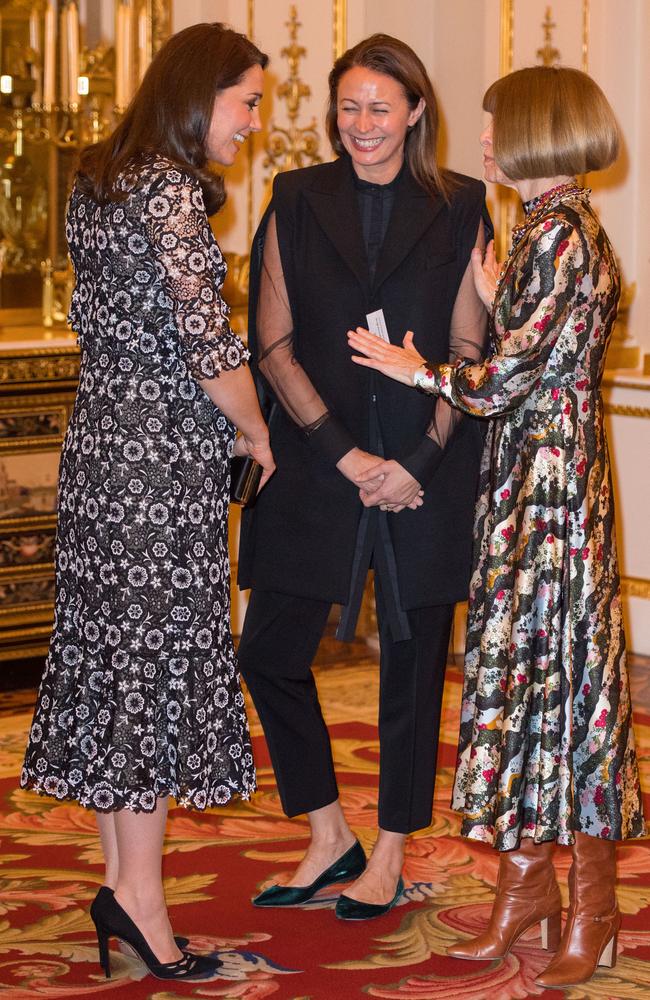 Catherine, Duchess of Cambridge shares a laugh with the Chief Executive of the British Fashion Council Caroline Rush and Vogue editor Anna Wintour. Picture: Dominic Lipinski — Pool/Getty Images