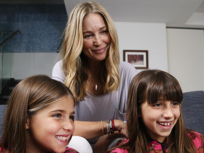 Penne Dennison with her daughters Andie Marks, 9, Tessa Marks, 8, at home in North Bondi today. (See pyjama volunteer story) Picture: Justin Lloyd