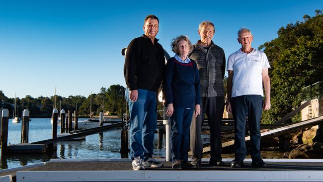 Gerry Manderson, Anne and Peter Massasso and George Citer on a private jetty near Glades Bay Park, Gladesville. Picture: Monique Harmer