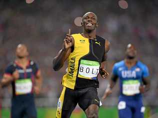 GOLD: Jamaican superstar and fastest man on earth, Usain Bolt wins the Men's 100m final at his third consecutive Olympics. Picture: Shaun Botterill