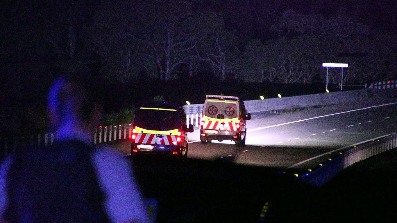 Two men were killed and one woman injured in a single-vehicle roll-over on the Pacific Highway near Glenugie on Sunday night. Picture: Frank Redward