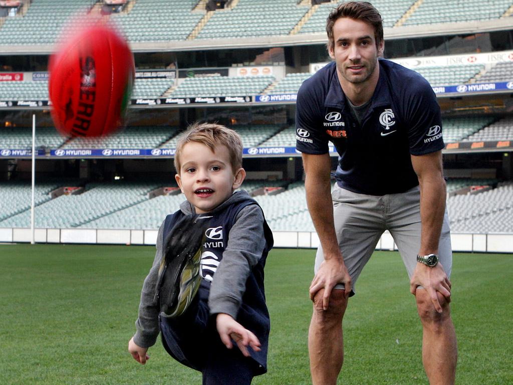 Cody Walker, pictured at age 4 with his father Andrew, has been around Carlton his whole life. Picture: Ian Currie