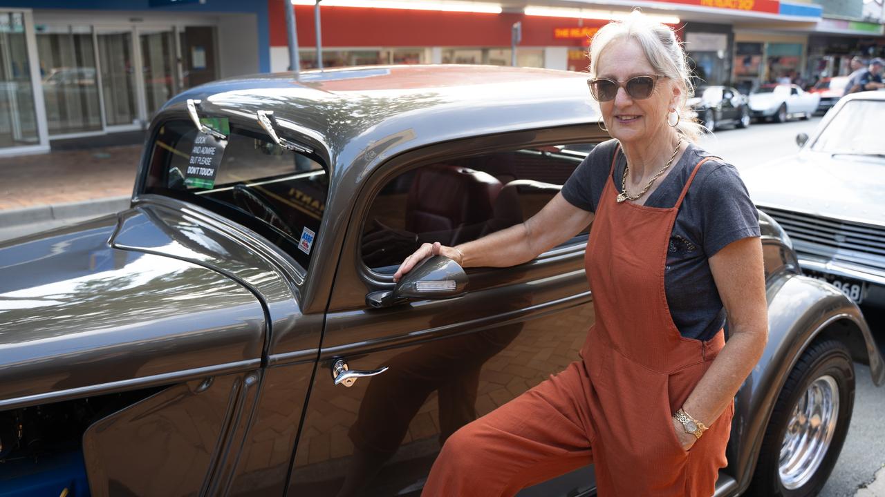 Dale Armstrong with her husband, Tony's '34 Ford Coupe at Mary Christmas, December 20,2023.