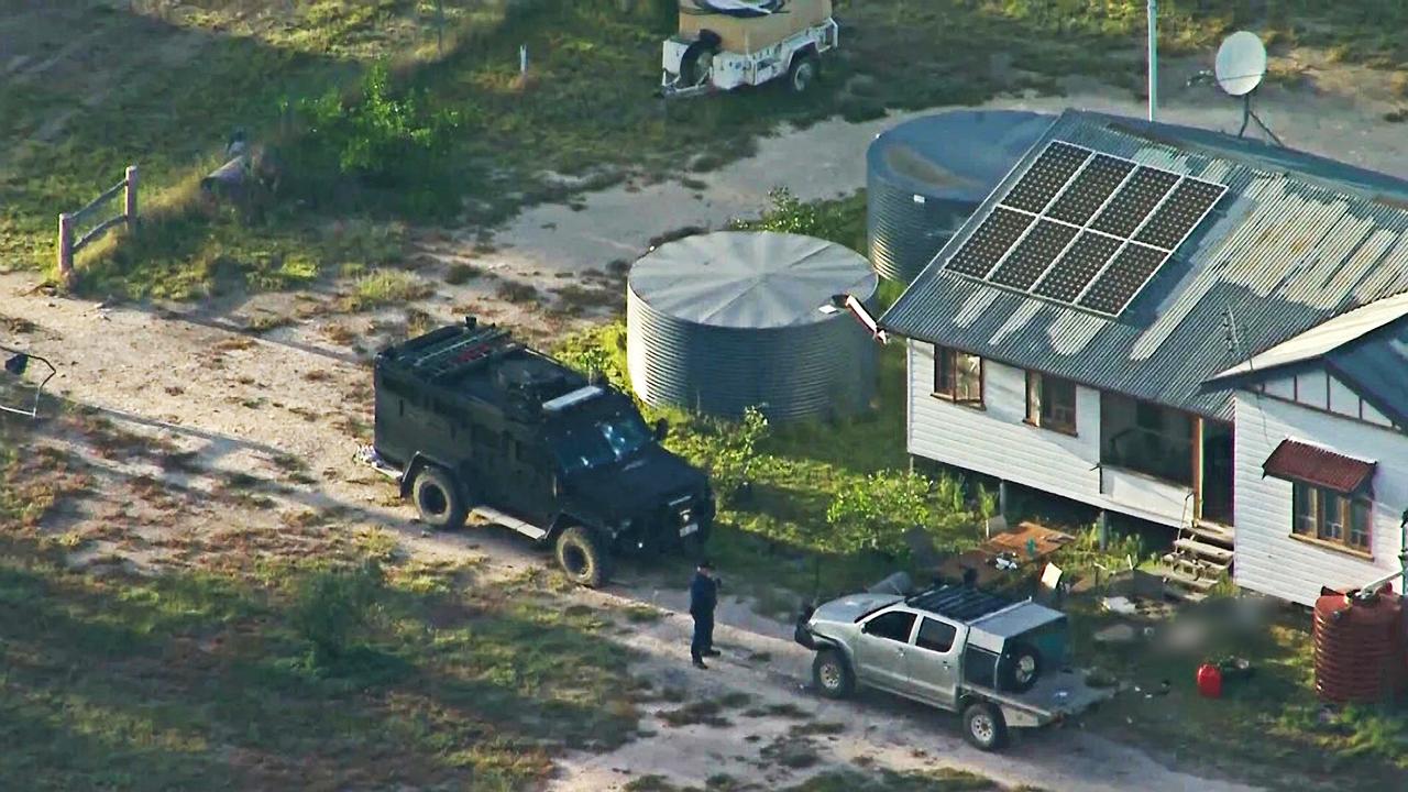 An aerial view of the scene at a property in Wieambilla where the shooting took place. A group of Source: Nine