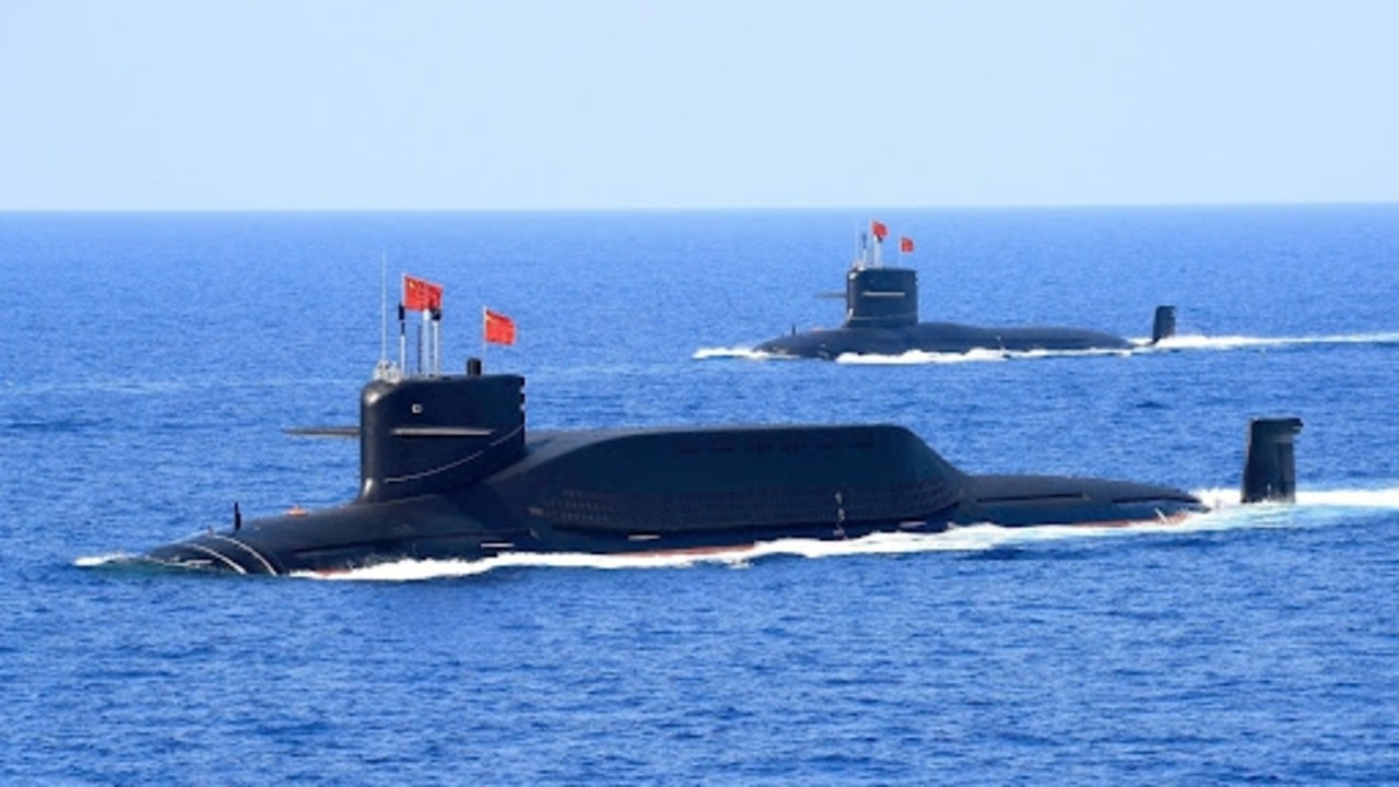 Chinese nuclear-powered missile and attack submarines parade for Chairman Xi Jinping. Picture: PLAN