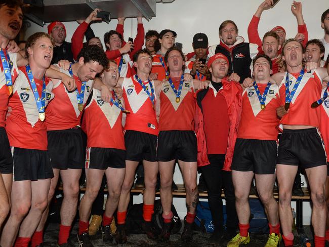 Red Hill players and supporters belt out the club song. Picture: Chris Eastman