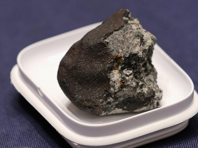 A fragment of the Chelyabinsk meteorite which came down in 2013. Picture: AFP.