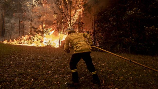 Bawley Point Property Fire. RFS Firefighters desperately worked to save a home on Willinga Drive at Bawley Point on Thursday. Picture Gary Ramage