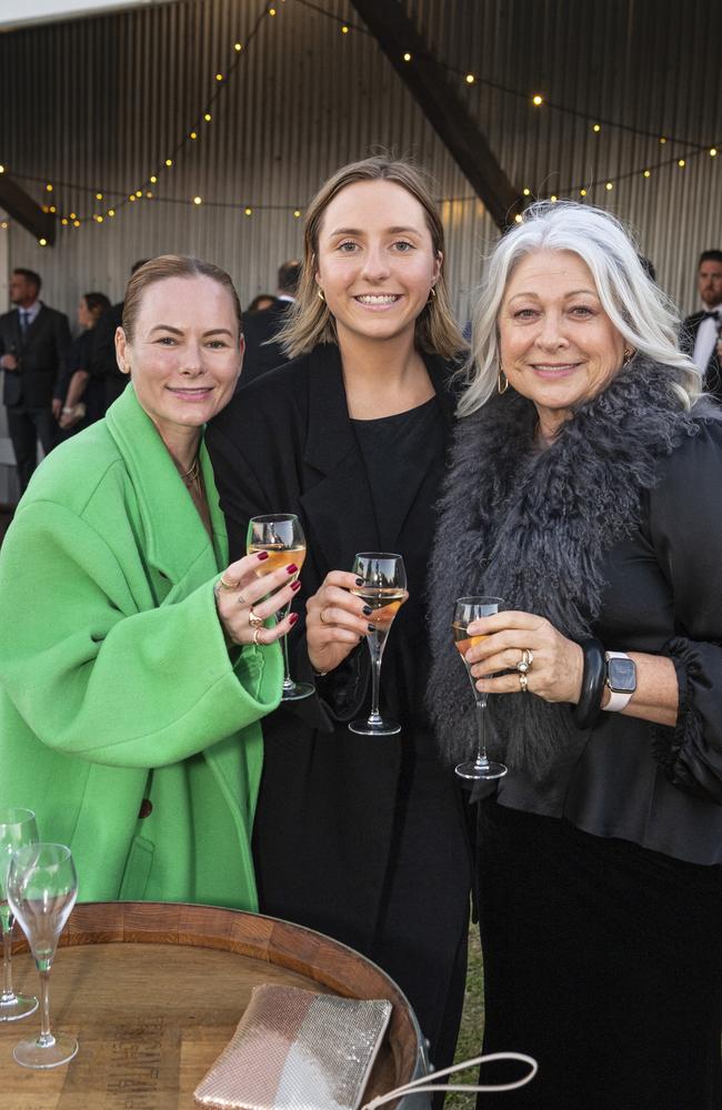 At LifeFlight Toowoomba Gala are (from left) Candy Browne, Sophie Frasle and Wendy Roche at The Goods Shed. Picture: Kevin Farmer