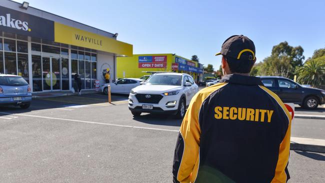 Drakes supermarket has employed security guards so only customers can use the carpark. Picture: NCA NewsWire / Brenton Edwards