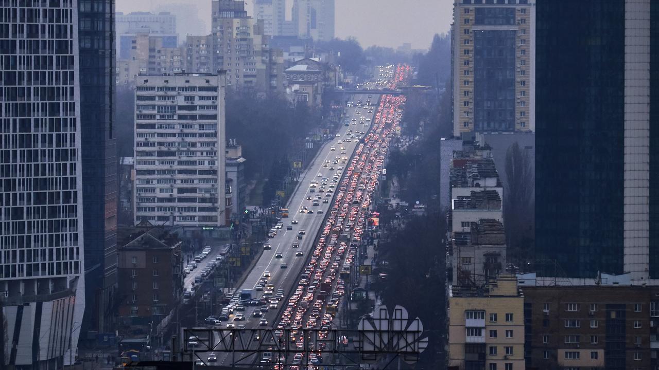 ars jammed motorways and people crowded into railway stations to evacuate cities in huge numbers. Picture; Pierre Crom/Getty Images.