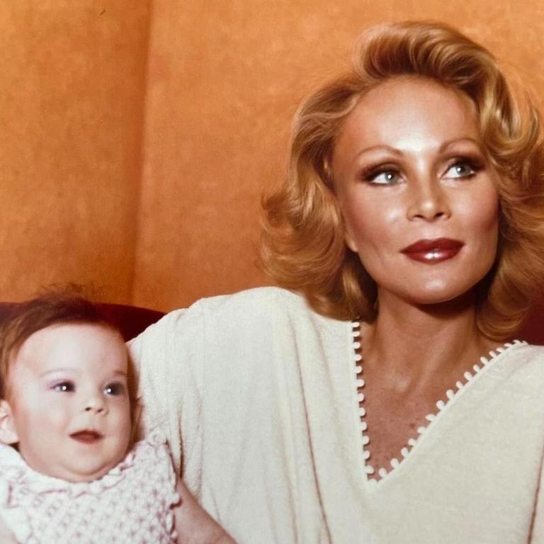 Wildenstein, seen here in the early years with daughter Diane, began undergoing extensive facial plastic surgery in an attempt to resemble a cat. Picture: news.com.au