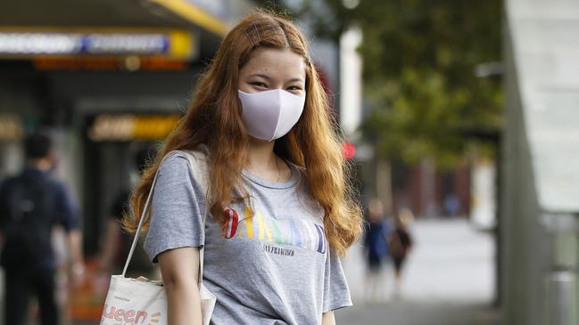 Student Dannie Bui. wearing a face masks to protect from Coronavirus outbreak near Central Station today. Picture: Dylan Robinson