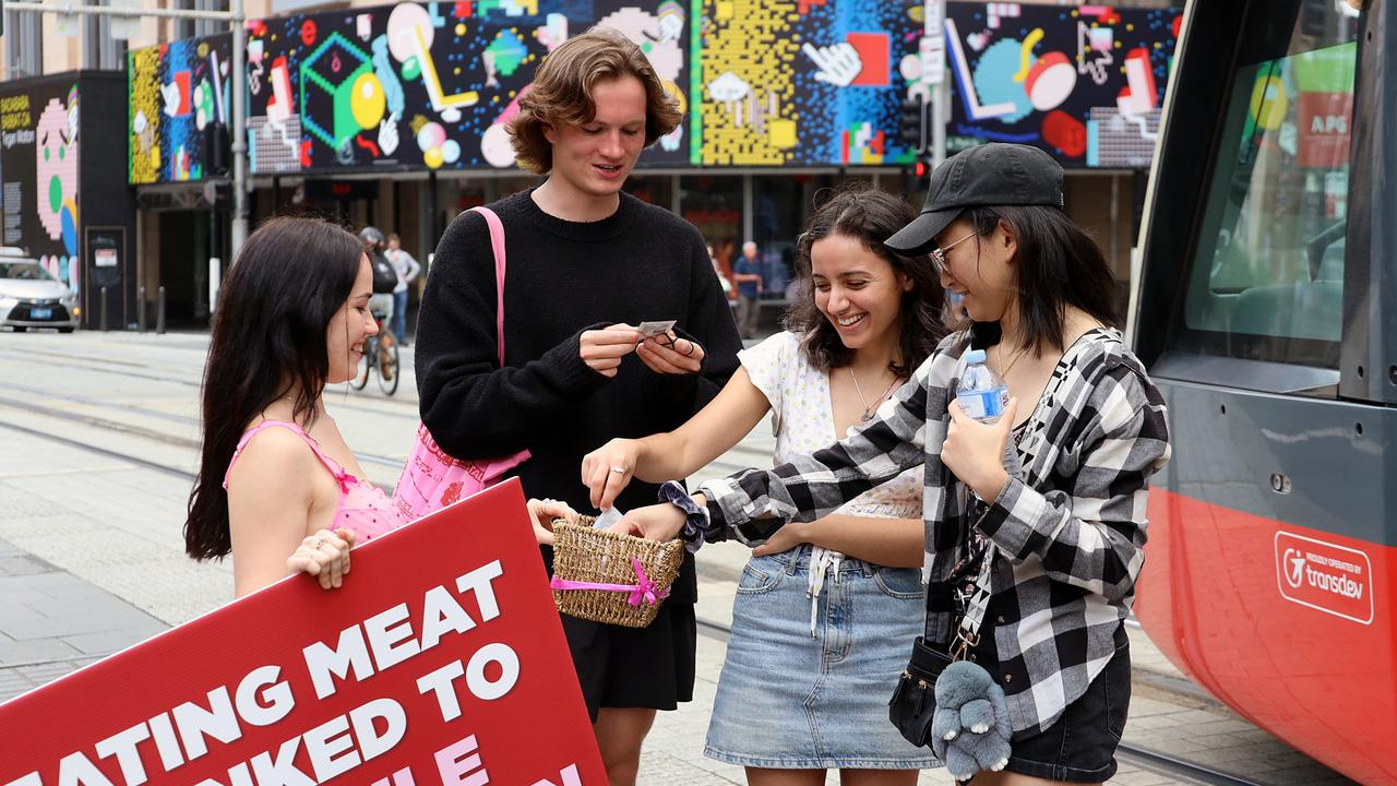 Activists handed out condoms to shoppers. Picture: NCA NewsWire/ Nicholas Eagar