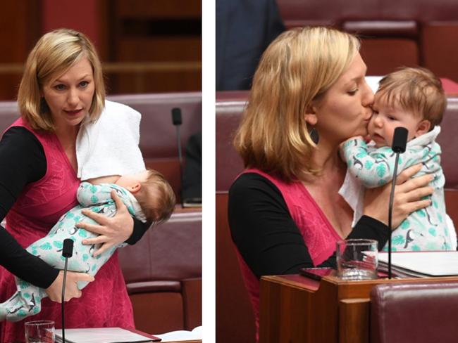 Australian Greens Senator Larissa Waters putting forward a motion on Black Lung disease while breastfeeding and kissing her daughter Alia Joy in the Senate. Picture: Lukas Coch/AAP