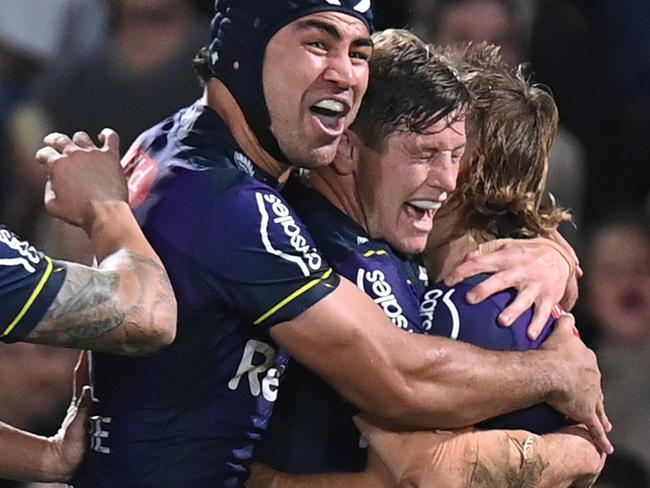 SUNSHINE COAST, AUSTRALIA - SEPTEMBER 10: Ryan Papenhuyzen of the Storm celebrates with team mates after scoring a try during the NRL Qualifying Final between the Melbourne Storm and the Manly Warringah Sea Eagles at Sunshine Coast Stadium on September 10, 2021, in Sunshine Coast, Australia. (Photo by Bradley Kanaris/Getty Images)