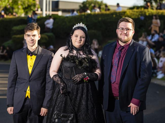 Arriving at Harristown State High School formal are (from left) Thomas McRae, Katiqua Rubesaame and Brayden Collins at Highfields Cultural Centre, Friday, November 18, 2022. Picture: Kevin Farmer