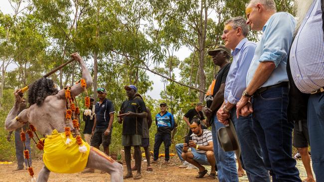 Cedric Marika poses in front of Prime Minister of Australia Anthony Albanese during the Garma Festival 2022.Picture: Tamati Smith/ Getty Images