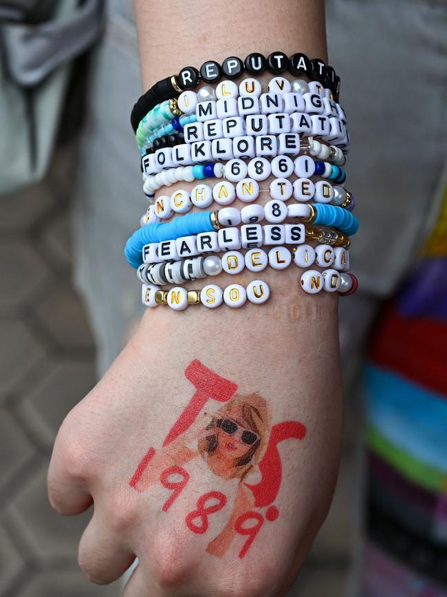 A fan with friendship bracelets ahead of Swift’s show in Singapore on March 7.