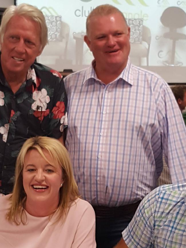 Fans Melanie and Gavin Watson pose for a photo with Jeff Thomson. Picture: Luisa Cogno